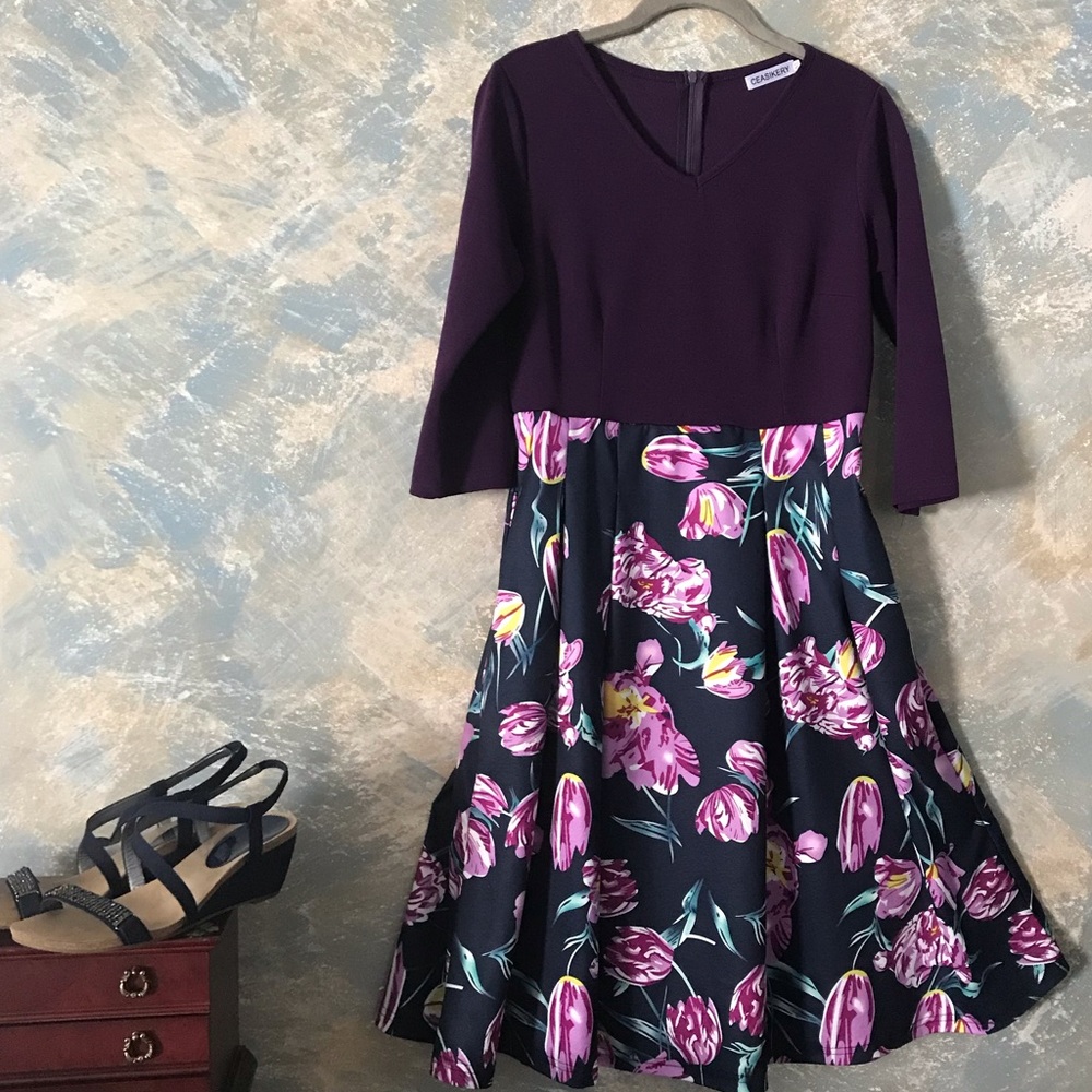 Purple 3/4 Sleeve Dress. Fit and Flare waist fit.